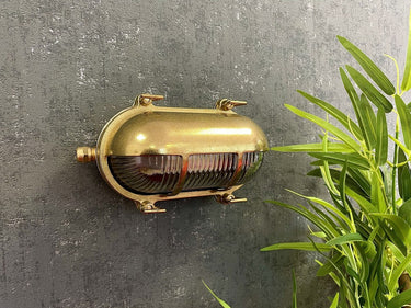 Newport Eyelid Oval Bulkhead Antique Brass